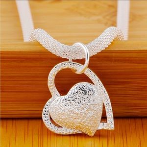 925 Sterling Silver thick snake style chain with a 925 silver hearts.